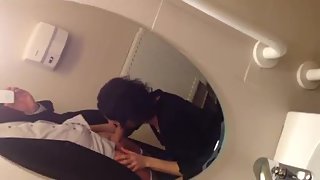 Douche blowjob in front of the mirror while out in the club