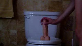 Wife rails her enormous plaything on the toliet
