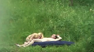 Nice blonde giving her balding lover oral and full sex outdoors