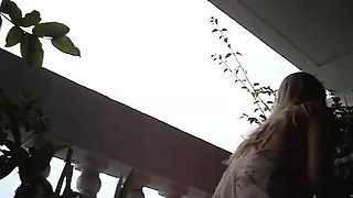 Super sexy upskirt damsel gets filmed at the balcony on the hidden camera